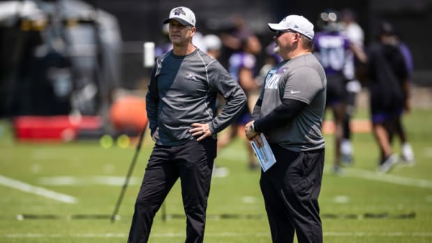 Baltimore Ravens head coach John Harbaugh and offensive coordinator Greg Roman